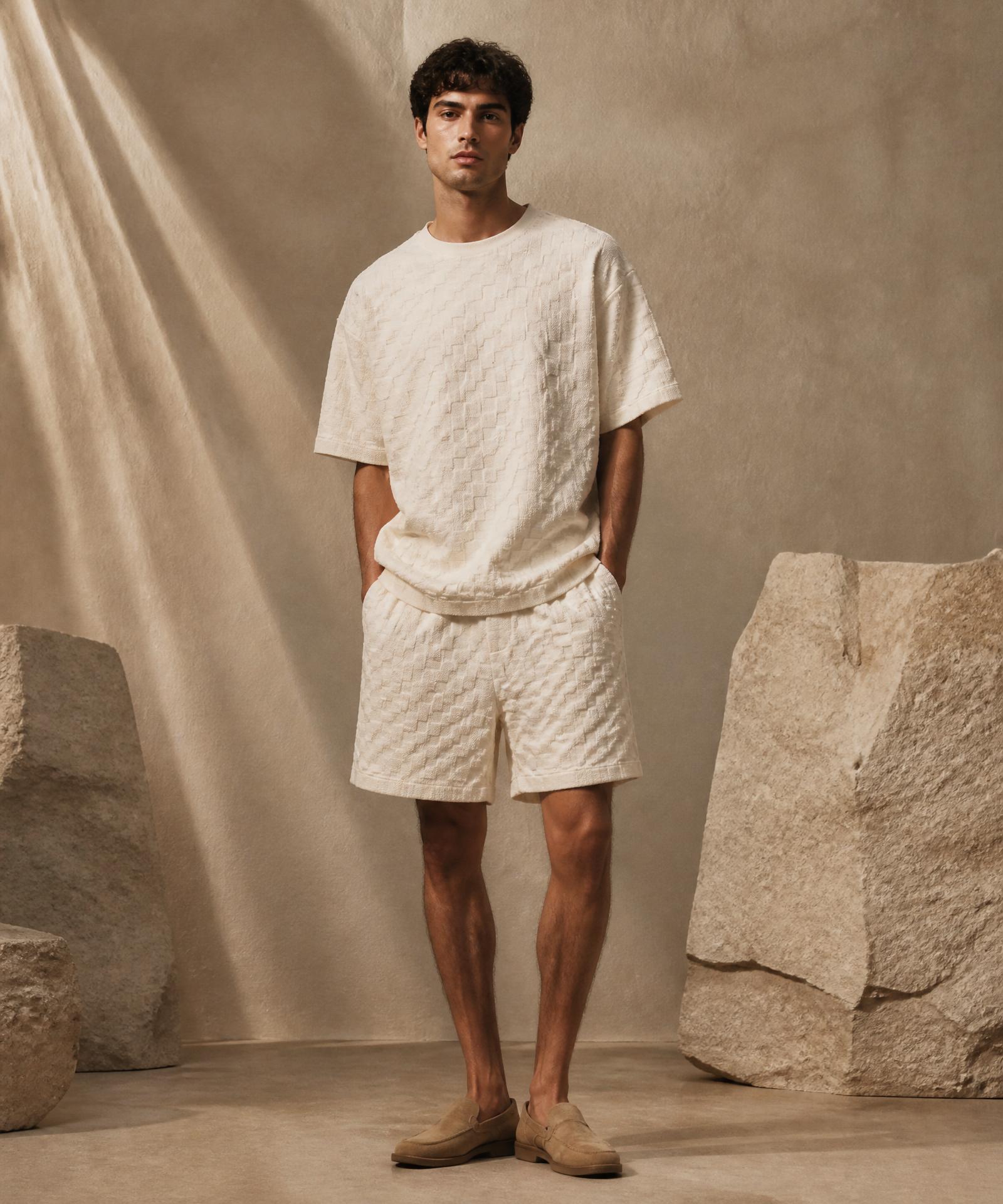 Model wearing KADE's off-white weave set